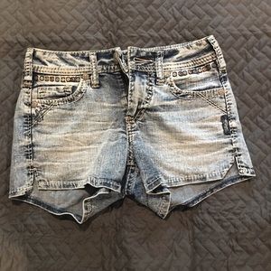 Silver SUPER STRETCH jean shorts.